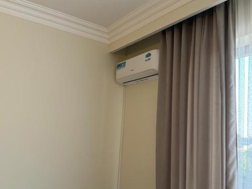 a air conditioner in a room next to a window at Velvet Vouge Hostel in Yerevan