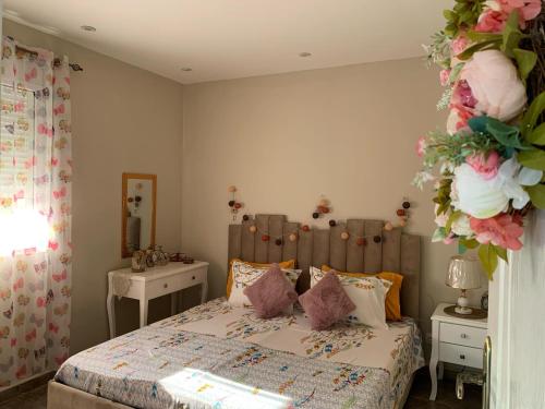 Ένα ή περισσότερα κρεβάτια σε δωμάτιο στο sweet home