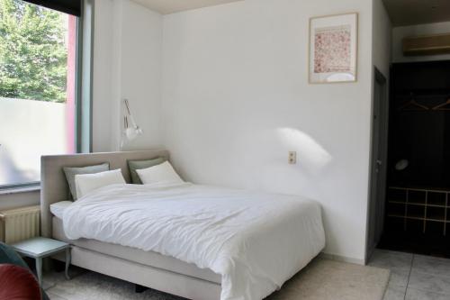 Postel nebo postele na pokoji v ubytování Cozy private suite