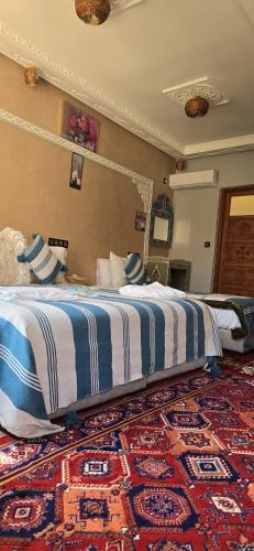 Cama o camas de una habitación en Riad Dar Omar