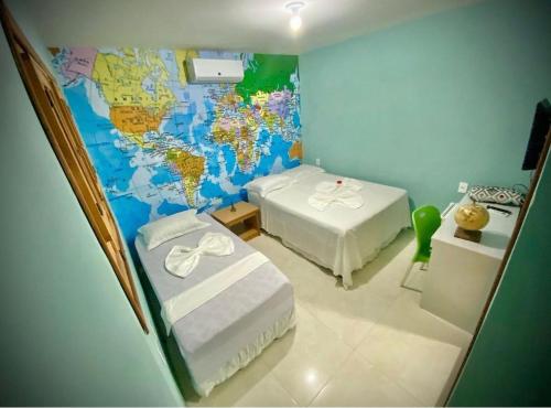 Postel nebo postele na pokoji v ubytování Sol Hostel & Pousada Maragogi