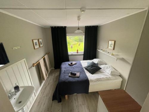Una cama o camas en una habitación de Skiers inn
