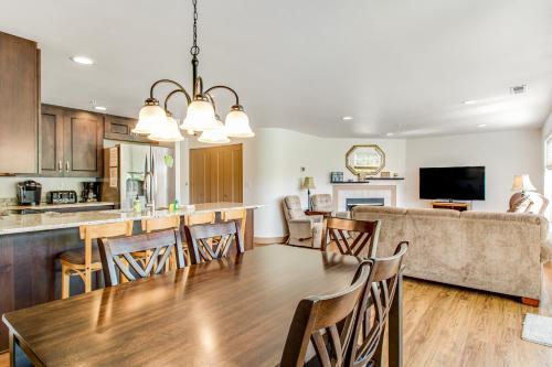 a kitchen and living room with a dining room table at Park Pointe: (A103) in Chelan