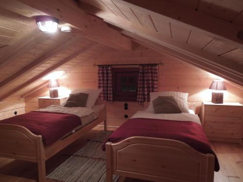 Postel nebo postele na pokoji v ubytování Blockhaus Bodefall