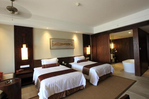 
Giường trong phòng chung tại Crowne Plaza Danang
