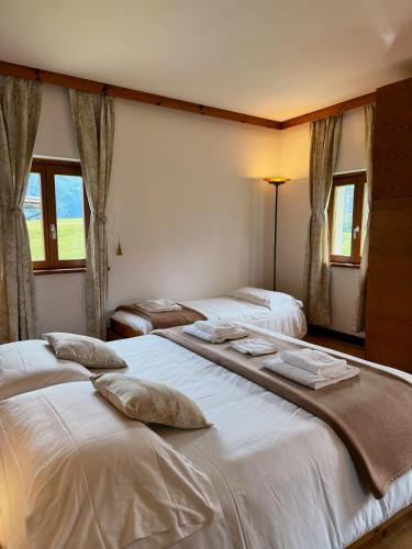 Cama o camas de una habitación en Neider Hotel - Alpine Retreat Sauris