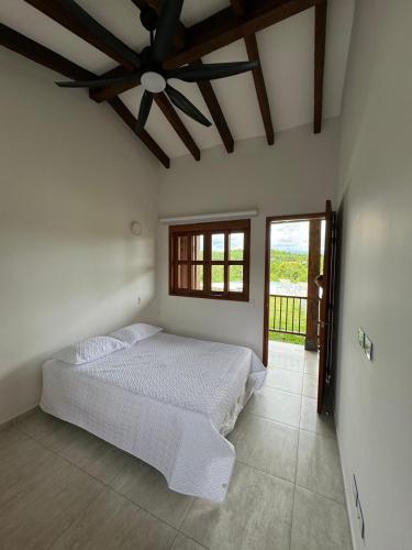 Ένα ή περισσότερα κρεβάτια σε δωμάτιο στο La Ilusion luxury farm-house