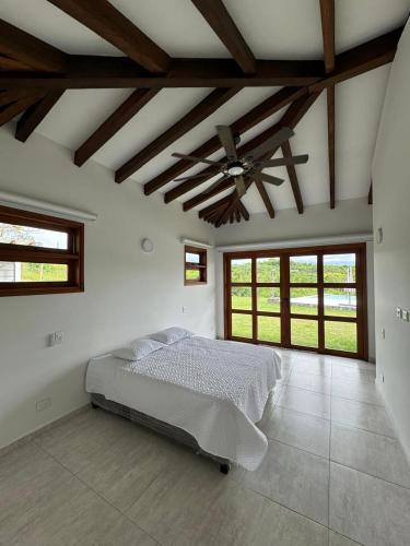Ένα ή περισσότερα κρεβάτια σε δωμάτιο στο La Ilusion luxury farm-house