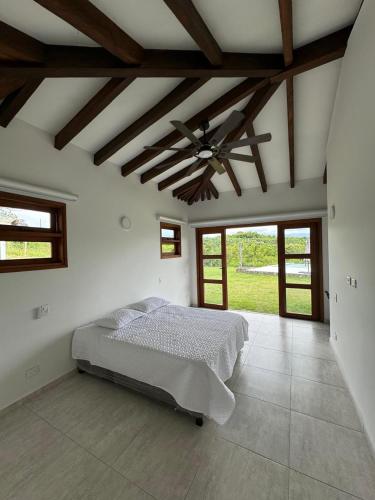 Ένα ή περισσότερα κρεβάτια σε δωμάτιο στο La Ilusion luxury farm-house