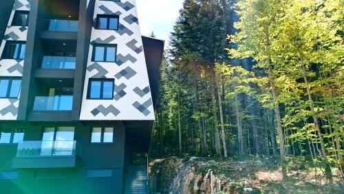 an aerial view of a building with trees at Oaza in Sarajevo