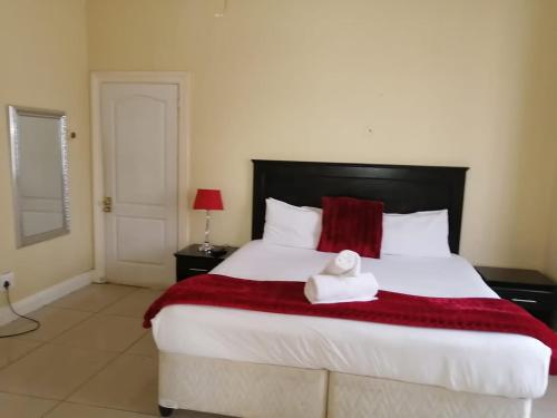 Giường trong phòng chung tại M place B&B