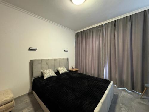 Postel nebo postele na pokoji v ubytování Aqua Blue TOP Apartment