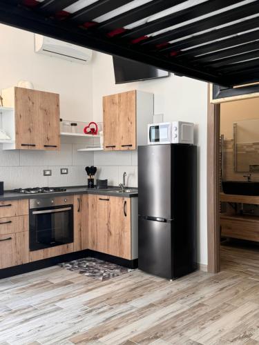 Kuchyň nebo kuchyňský kout v ubytování Casa Benzi