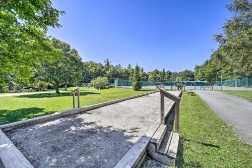 a path in a park with trees and a fence at 6 Mi to Grandfather Mtn Peaceful Getaway with Grill in Newland