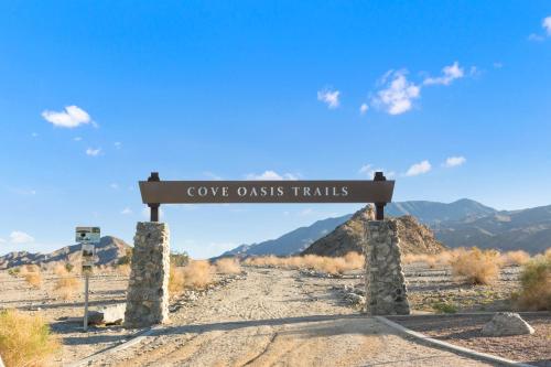 a sign that says come oaks trails in the desert at La Quinta Cove Oasis - Pool,Spa,Hiking,Tennis,Golf,Stagecoach and Coachella! in La Quinta