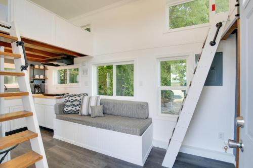 a tiny house with a bench in a kitchen at The Chardonnay Chalet Defiance Studio Trail! in Defiance