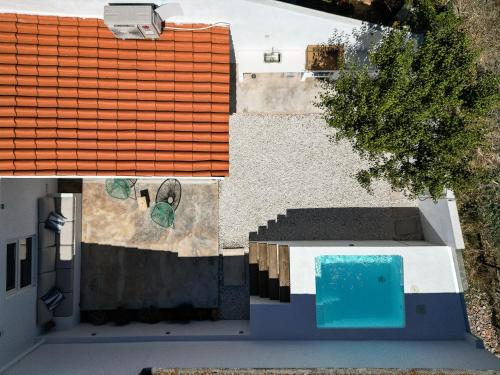 an overhead view of a house with a roof at Casa Paraíso in Ferreira do Alentejo