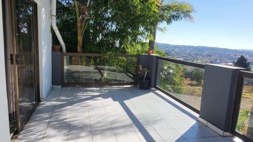 a balcony of a house with a view at The Concept in Centurion