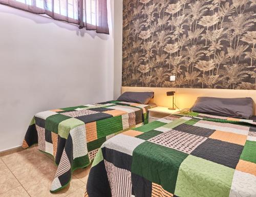 Postel nebo postele na pokoji v ubytování Barbados Playa del Ingles Apartamento