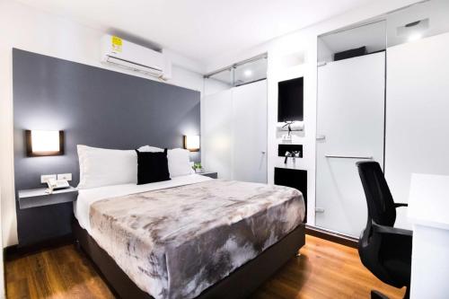 Letto o letti in una camera di Hotel Z3 Pereira