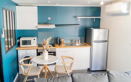 Kuchyň nebo kuchyňský kout v ubytování Appartement à 15 min de bordeaux