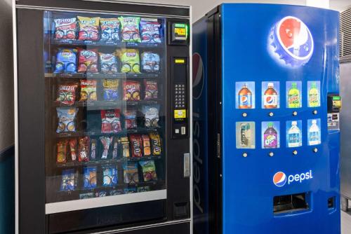 a vending machine filled with lots of food and drinks at Days Inn by Wyndham Hornell NY in Hornell