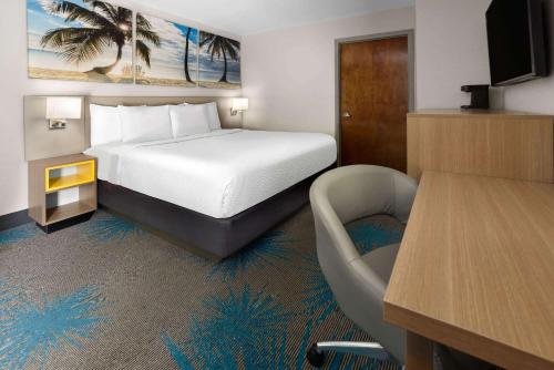 Ένα ή περισσότερα κρεβάτια σε δωμάτιο στο Days Inn by Wyndham Acworth