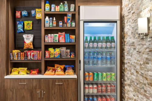 a refrigerator filled with lots of different types of drinks at Baymont by Wyndham Georgetown Lexington North in Georgetown