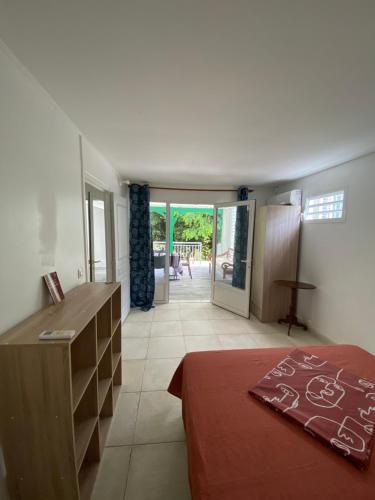 Postel nebo postele na pokoji v ubytování Appartement paisible avec jardin