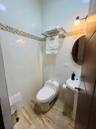 Salle de bains dans l'établissement Caruzo Hotel and suites