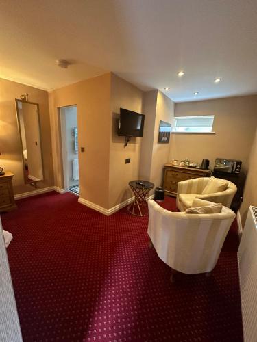 TV o dispositivi per l'intrattenimento presso The Chester Court Hotel
