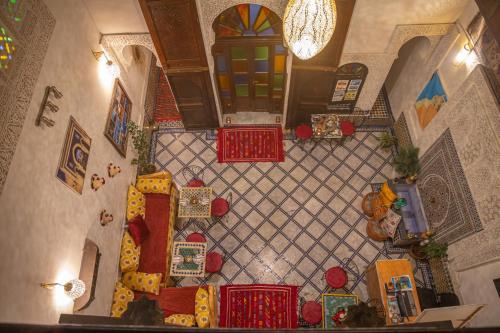 an overhead view of a living room with christmas decorations at Dar Lalamoune in Fès