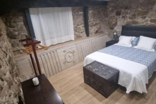 Postel nebo postele na pokoji v ubytování Apartamento Villa Cardil entrada Cabarceno