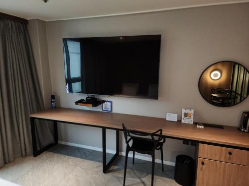 TV o dispositivi per l'intrattenimento presso Queentown hotel