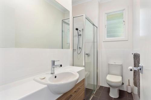 a white bathroom with a sink and a toilet at The Cutting Colman Pl Port Elliot - No Linen Included in Port Elliot