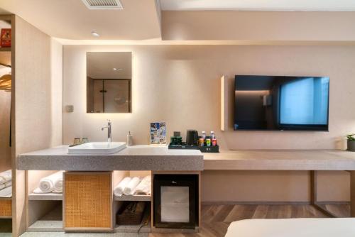 Kuchyň nebo kuchyňský kout v ubytování True Go Hotel Shanghai Xujiahui