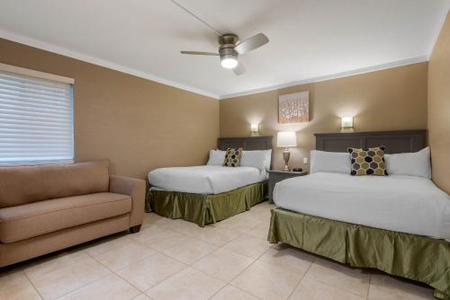 Ένα ή περισσότερα κρεβάτια σε δωμάτιο στο Villas Of Amelia Island