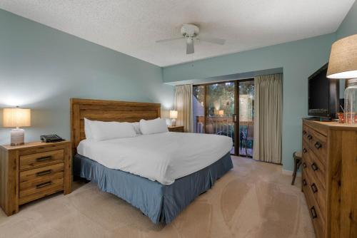 Ένα ή περισσότερα κρεβάτια σε δωμάτιο στο Villas Of Amelia Island