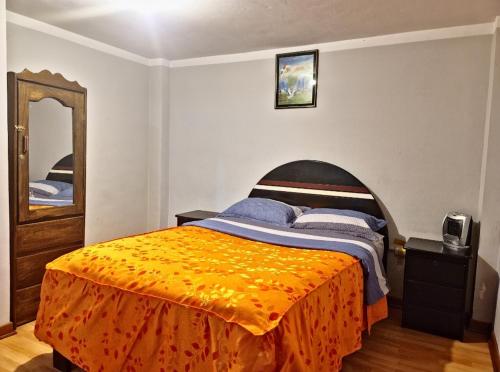 Cama o camas de una habitación en Hospedaje Qoricha'skas Airport