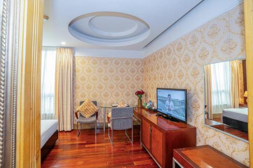 TV a/nebo společenská místnost v ubytování The Vissai Hotel