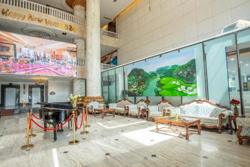 TV a/nebo společenská místnost v ubytování The Vissai Hotel