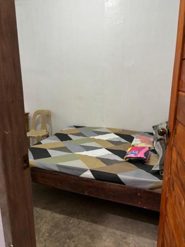 Rose Homestay, near Cloud9, Tourism Road and Surfing spots客房内的一张或多张床位