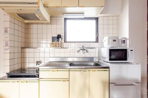 Køkken eller tekøkken på 立石5丁目m402