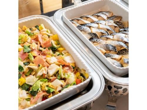 two trays of food with different types of seafood at Hotel Terrace The Square Hitachi - Vacation STAY 17001v in Hitachi