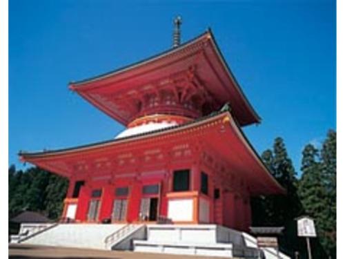 a red building with a cross on top of it at Misato no Yu Kajikaso - Vacation STAY 22197v in Kimino