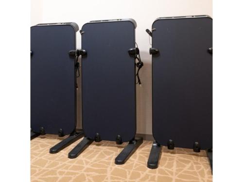 a couple of black doors sitting on the floor at Hotel Terrace The Square Hitachi - Vacation STAY 21902v in Hitachi