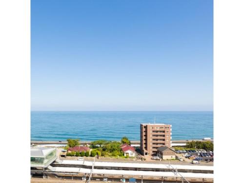 a view of the ocean from a building at Hotel Terrace The Square Hitachi - Vacation STAY 21902v in Hitachi