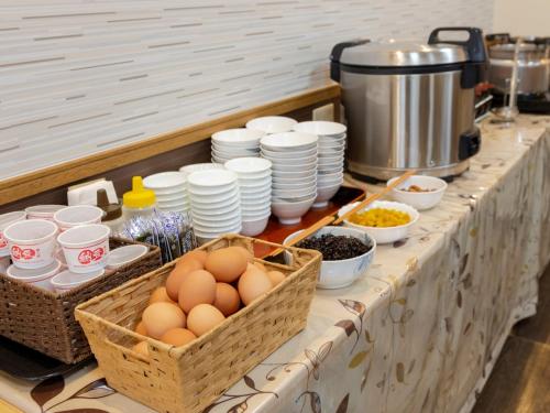 a buffet with eggs and dishes on a table at Sun Hotel Tosu Saga - Vacation STAY 49476v in Tosu