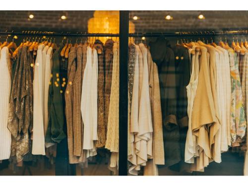 a closet filled with lots of clothes on racks at Sun Hotel Tosu Saga - Vacation STAY 49476v in Tosu