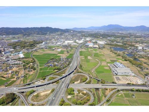 an aerial view of a city with a highway at Sun Hotel Tosu Saga - Vacation STAY 49470v in Tosu